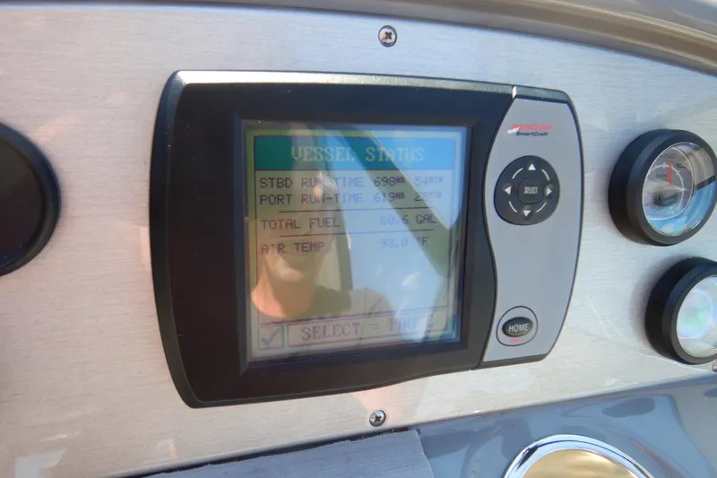 Sunny Daze Yacht Photos Pics 2007 Cruisers 340 Express dashboard with SmartCraft display showing vessel status and gauges.