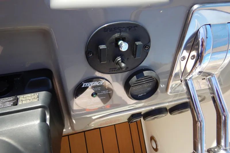 Sunny Daze Yacht Photos Pics 2007 Cruisers 340 Express dashboard with controls and Fireboy system.