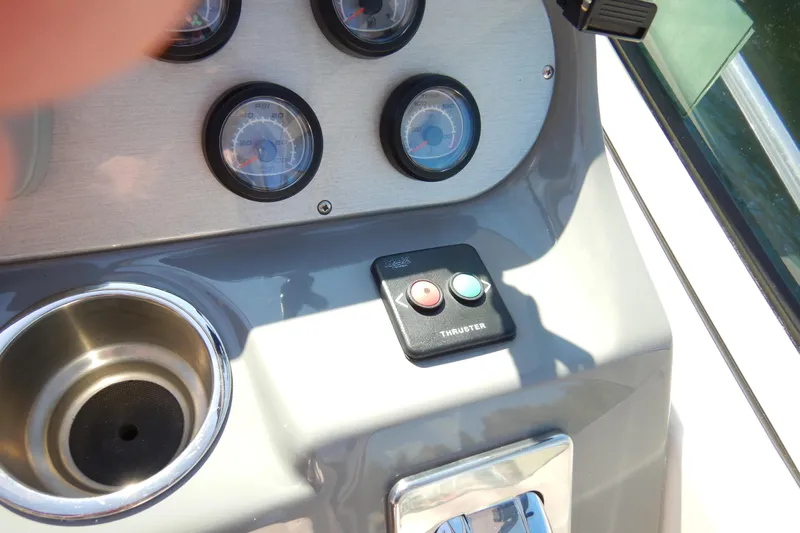 Sunny Daze Yacht Photos Pics Dashboard of 2007 Cruisers 340 Express with gauges and thruster controls.