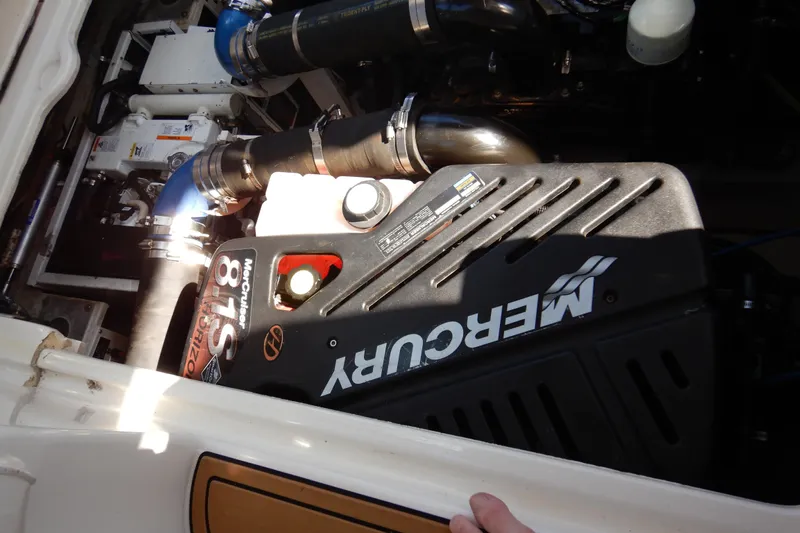Sunny Daze Yacht Photos Pics Engine compartment of a 2007 Cruisers 340 Express with Mercury engine components.
