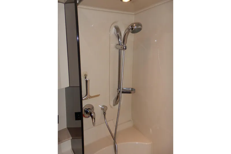 Sunny Daze Yacht Photos Pics Shower area in 2007 Cruisers 340 Express yacht, featuring modern fixtures.