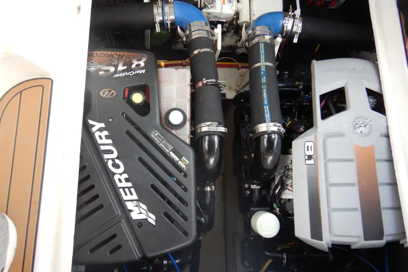 Sunny Daze Yacht Photos Pics Engine compartment of a 2007 Cruisers 340 Express with Mercury 8.1 engines.