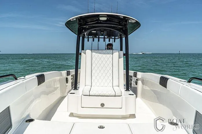  Yacht Photos Pics 2022 CG Boat Works 35 M-Series on open water, featuring sleek design and luxurious seating.