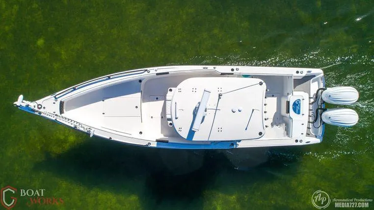  Yacht Photos Pics Aerial view of 2022 CG Boat Works 35 M-Series on clear water.