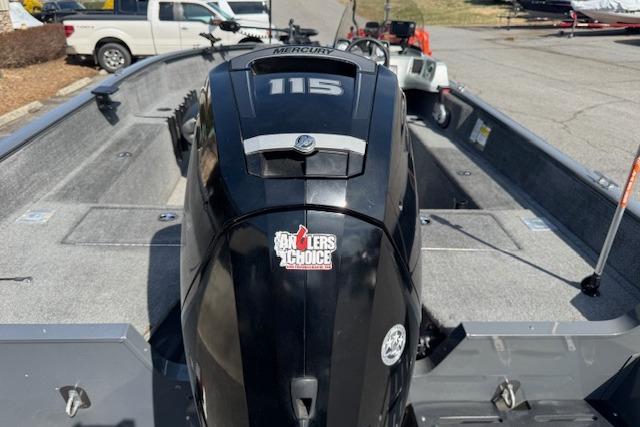 2018 Tracker Pro Guide V-175 SC boat with Mercury 115 engine, parked outdoors.
