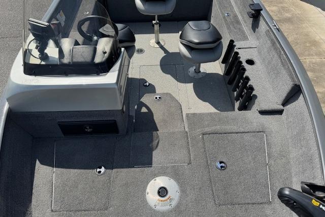2018 Tracker Pro Guide V-175 SC boat interior with seating and storage compartments.