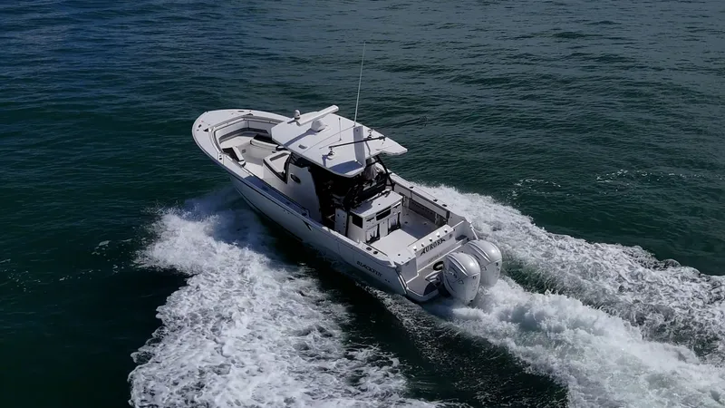 Aurora Yacht Photos Pics Aerial view of 2019 Blackfin 332 boat cruising on open water.