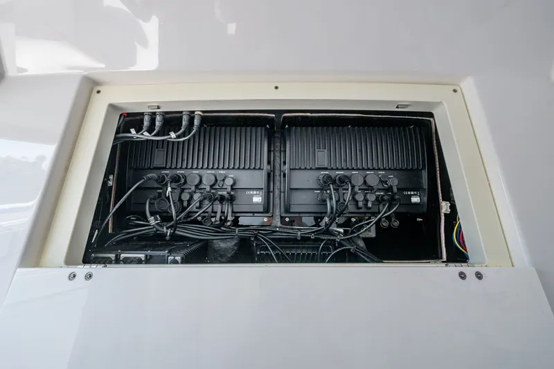Aurora Yacht Photos Pics Electrical system compartment of a 2019 Blackfin 332 boat, showcasing wiring and components.