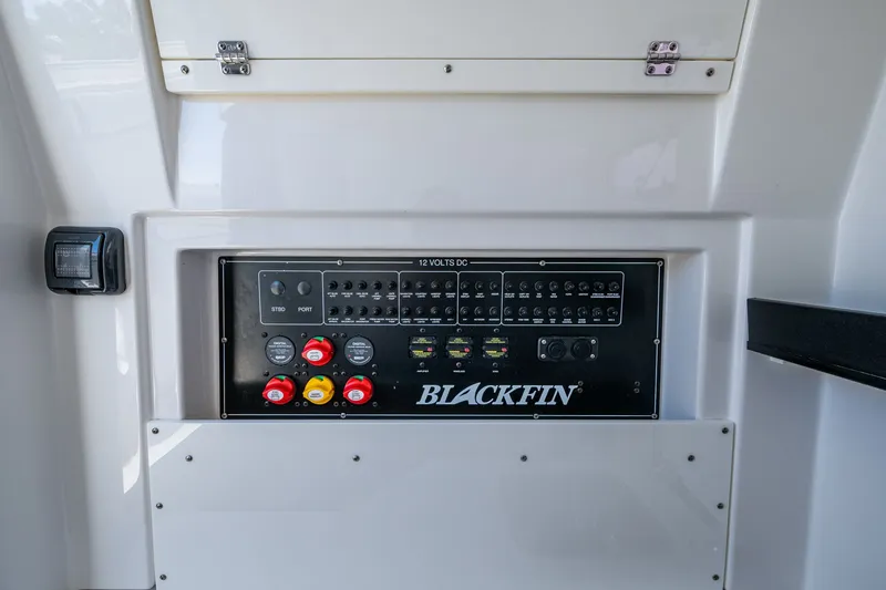 Aurora Yacht Photos Pics Control panel of a 2019 Blackfin 332 boat with switches and dials.