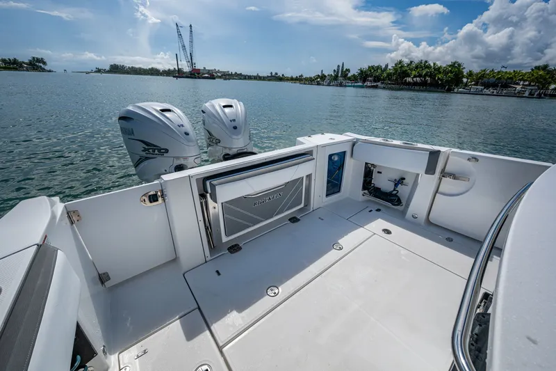 Aurora Yacht Photos Pics 2019 Blackfin 332 boat with dual Yamaha V8 engines on a sunny day.