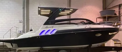 Ready For Immediate Delivery Yacht Photos Pics 2025 Hanover 305 Outboard Black & White T-Top Edition boat in showroom.