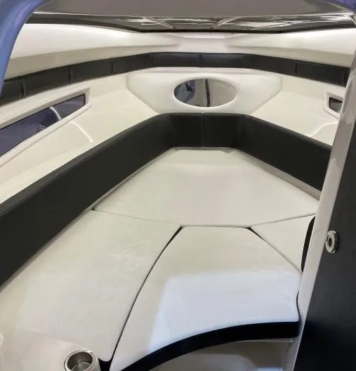 Ready For Immediate Delivery Yacht Photos Pics 2025 Hanover 305 Outboard T-Top Edition interior, featuring sleek black and white seating.
