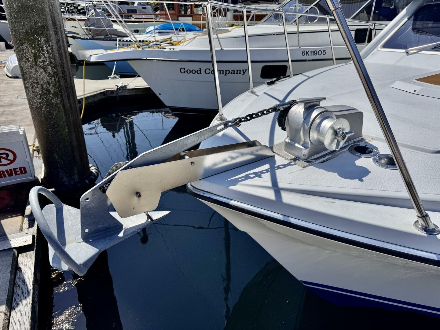 Bow of a 1985 Commander 30 boat with anchor and winch system.