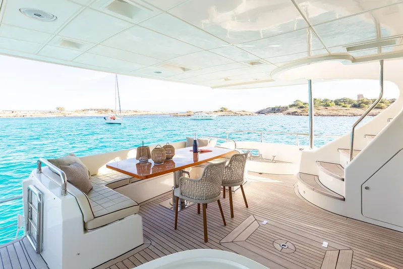 Exit Yacht Photos Pics Luxurious 2008 Azimut 75 yacht deck with elegant seating and ocean view.