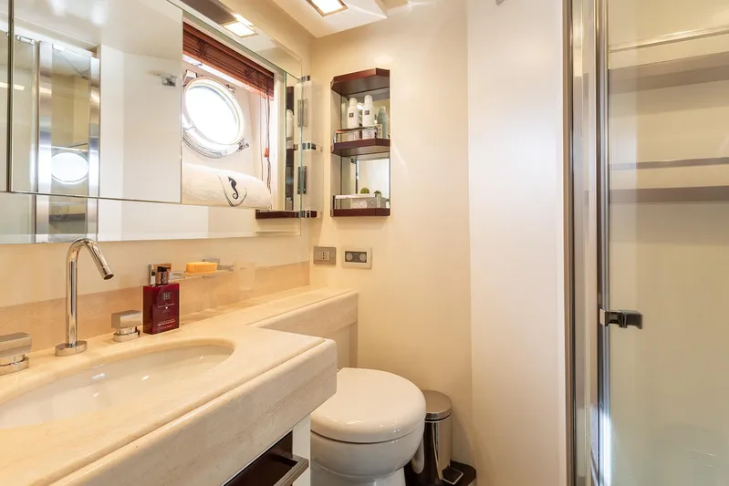 Exit Yacht Photos Pics Luxurious bathroom on 2008 Azimut 75 yacht with modern fixtures and elegant design.