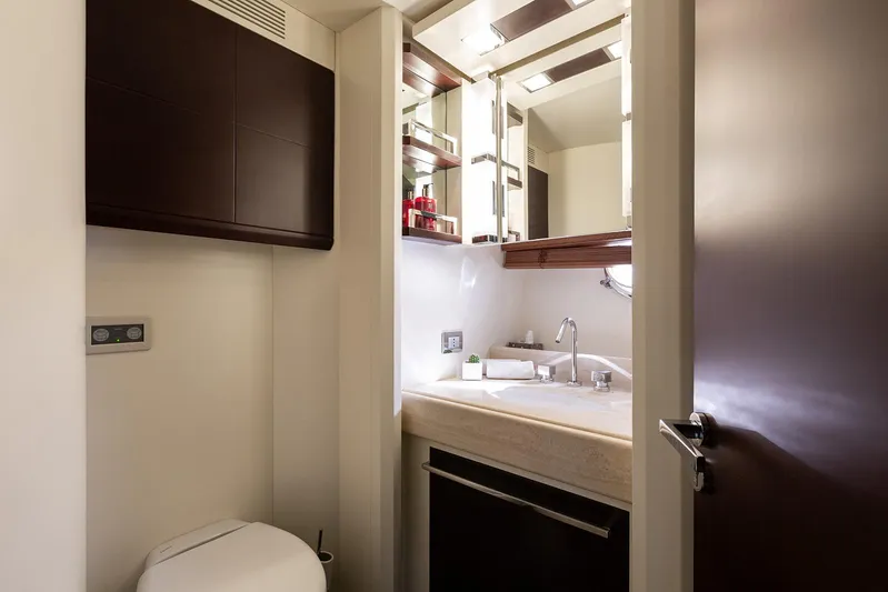 Exit Yacht Photos Pics Luxurious bathroom interior of 2008 Azimut 75 yacht, featuring modern fixtures and elegant design.