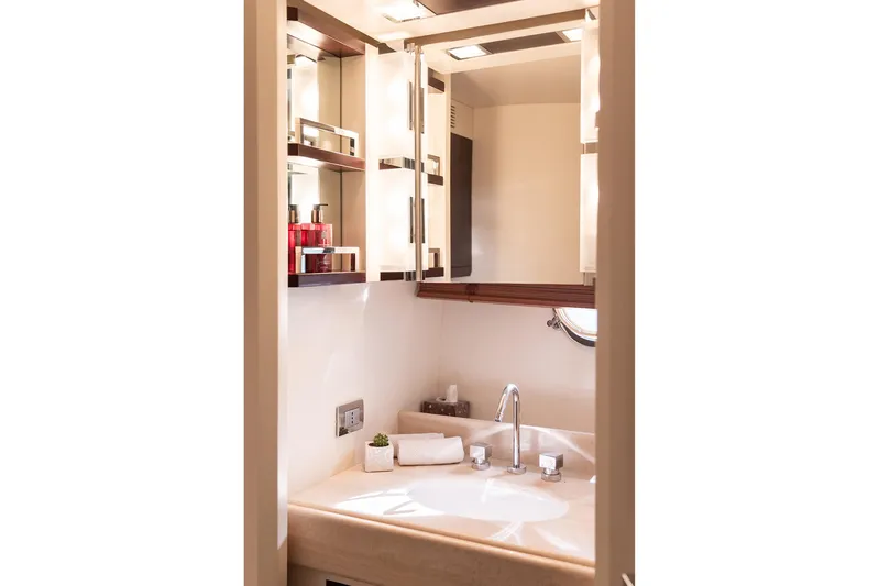 Exit Yacht Photos Pics Luxurious bathroom interior of 2008 Azimut 75 yacht with modern fixtures and elegant design.