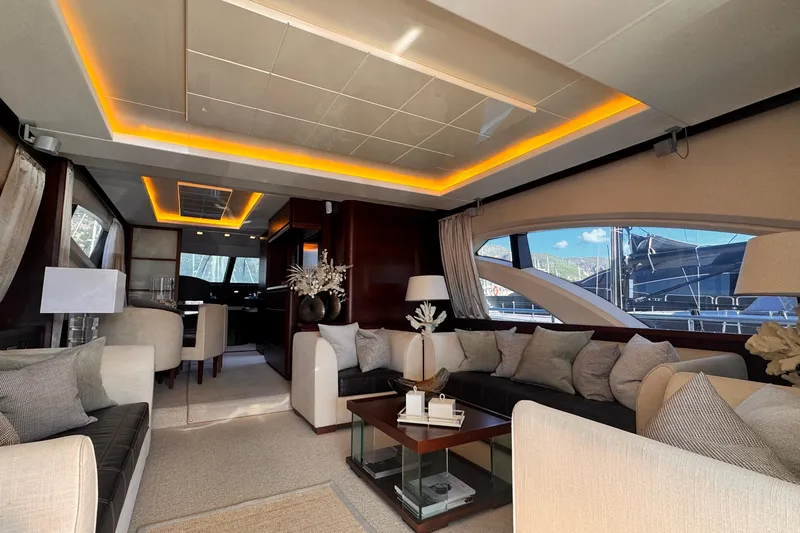 Exit Yacht Photos Pics Luxurious interior of a 2008 Azimut 75 yacht with elegant seating and ambient lighting.
