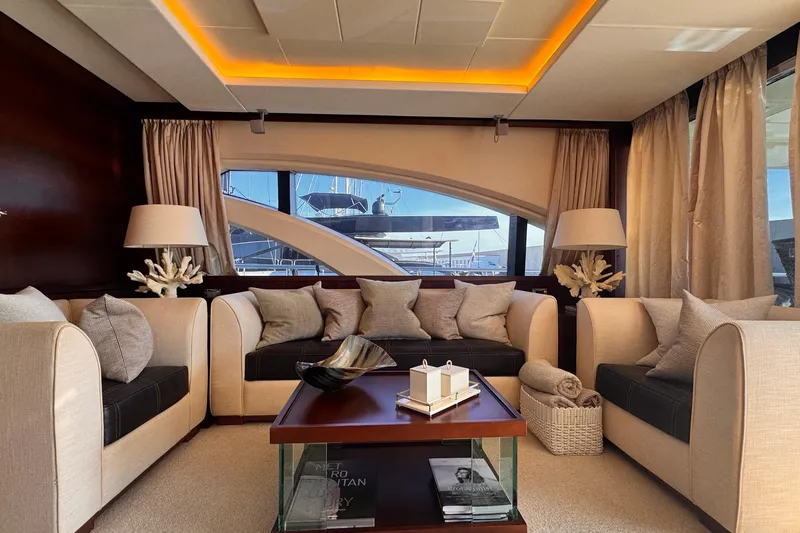 Exit Yacht Photos Pics Luxurious interior of 2008 Azimut 75 yacht with elegant seating and decor.
