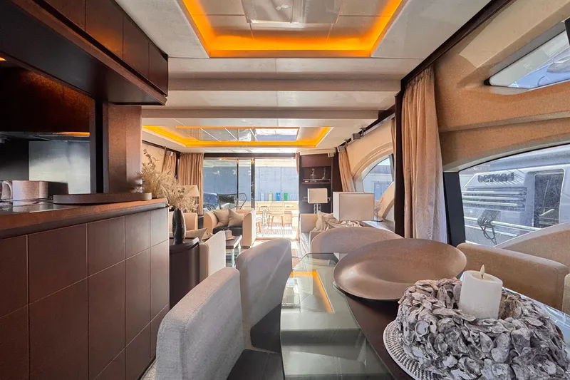 Exit Yacht Photos Pics Luxurious interior of a 2008 Azimut 75 yacht with elegant furnishings and ambient lighting.