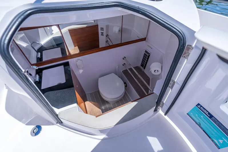  Yacht Photos Pics Interior view of 2022 Axopar 28 T-Top Brabus boat bathroom.