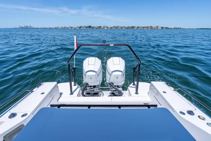  Yacht Photos Pics Axopar 28 T-Top Brabus 2022 boat with dual engines on open water.