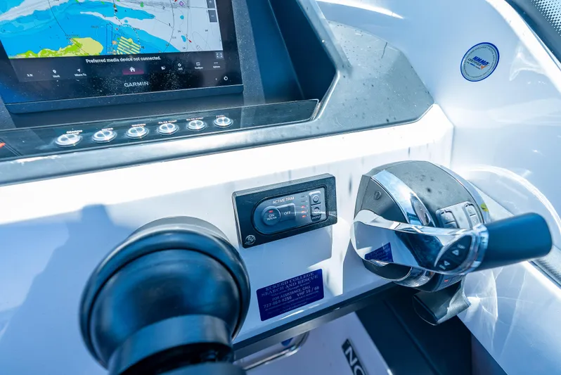  Yacht Photos Pics Control panel of 2022 Axopar 28 T-Top Brabus with Garmin navigation display.