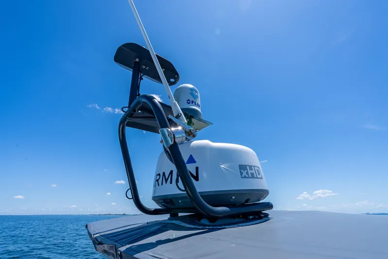  Yacht Photos Pics Radar equipment on 2022 Axopar 28 T-Top Brabus under clear blue sky.