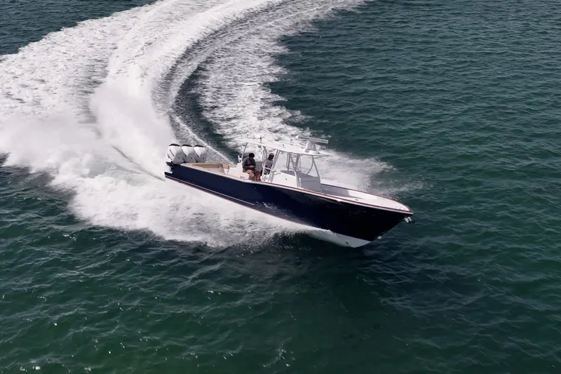 Effortless Yacht Photos Pics 2018 Bonadeo 37 WACC boat cruising swiftly on open water.