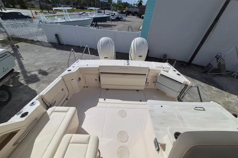 345-624 Yacht Photos Pics 2026 Grady-White Freedom 345 boat interior with seating and dual engines.