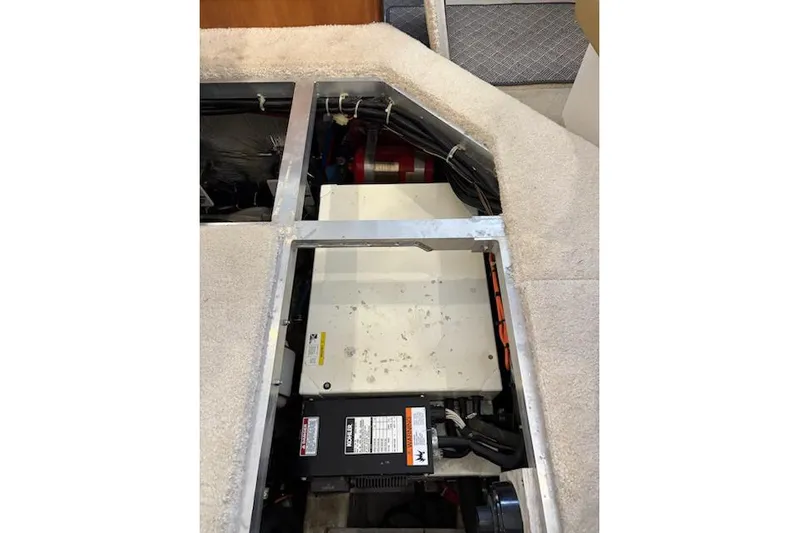  Yacht Photos Pics Engine compartment of a 2001 Carver 356 Motor Yacht, showcasing mechanical components.