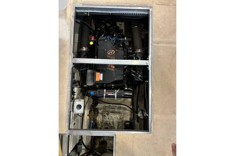  Yacht Photos Pics Engine compartment of a 2001 Carver 356 Motor Yacht, showcasing mechanical components.