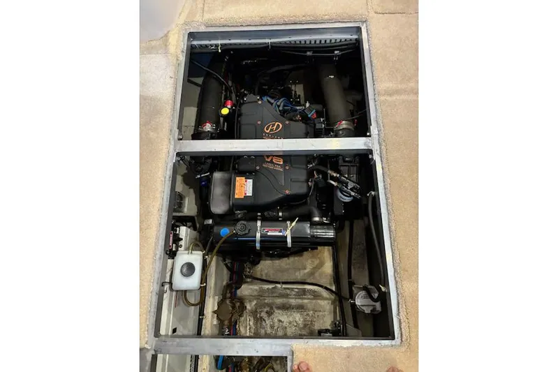  Yacht Photos Pics Engine compartment of a 2001 Carver 356 Motor Yacht, featuring a V8 engine.