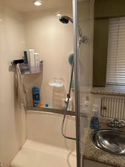  Yacht Photos Pics Shower area in 2001 Carver 356 Motor Yacht with sink and toiletries.