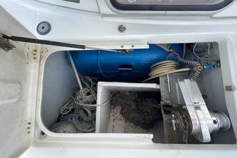 Plan B Yacht Photos Pics Anchor locker of a 2002 Lagoon 380 catamaran with ropes and equipment.
