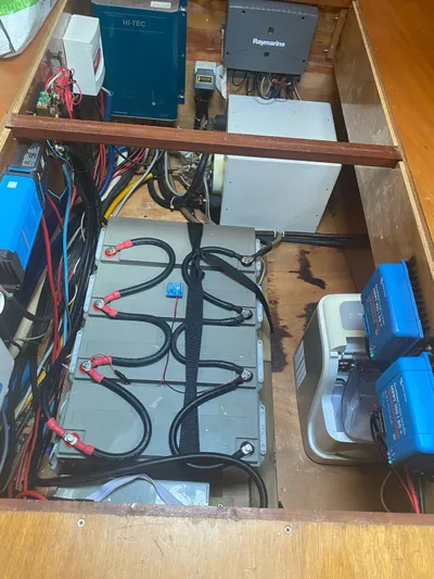 Plan B Yacht Photos Pics Electrical system setup in a 2002 Lagoon 380 catamaran, featuring batteries and wiring.