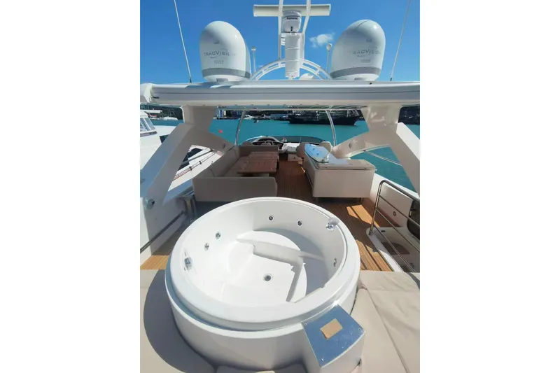 Yacht Photos Pics Luxurious 2011 Sunseeker 88 Yacht deck with jacuzzi and seating area.
