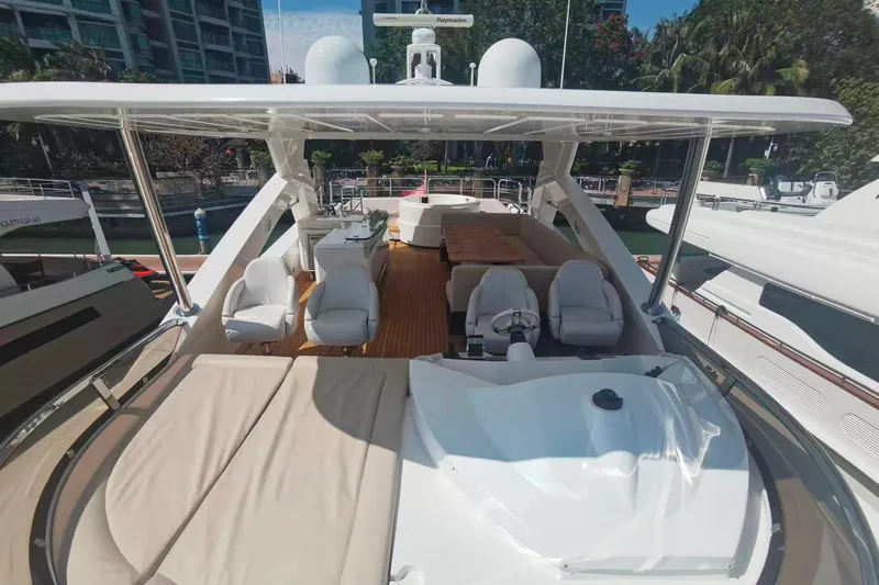  Yacht Photos Pics Luxurious 2011 Sunseeker 88 Yacht with spacious deck and elegant seating area.