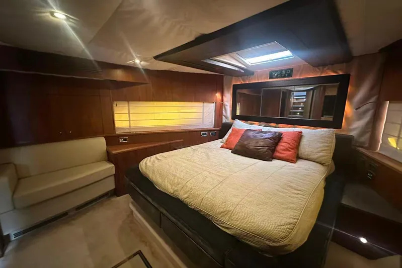  Yacht Photos Pics Luxurious bedroom interior of 2011 Sunseeker 88 Yacht with plush bedding and elegant decor.