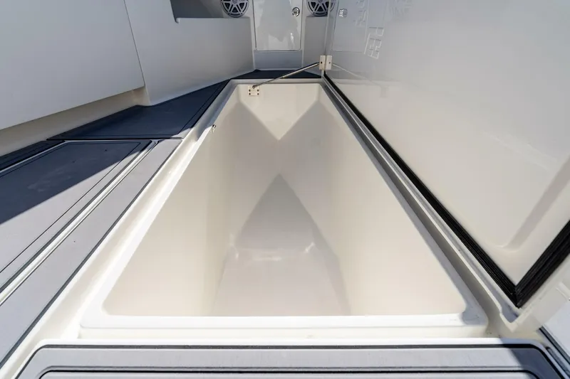 Susan L Yacht Photos Pics 2018 SeaVee 370 Z boat storage compartment, open and spacious interior view.
