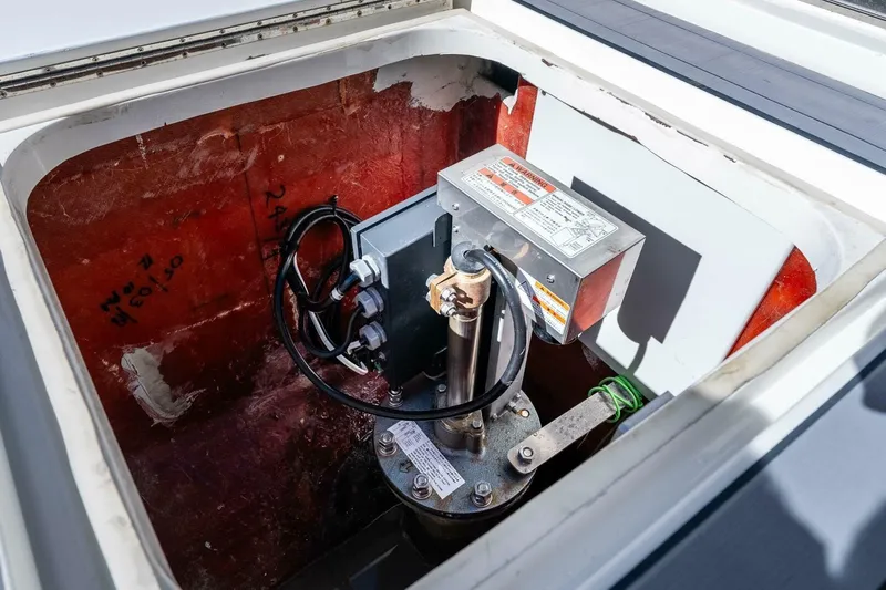 Susan L Yacht Photos Pics 2018 SeaVee 370 Z boat compartment with mechanical equipment and wiring.