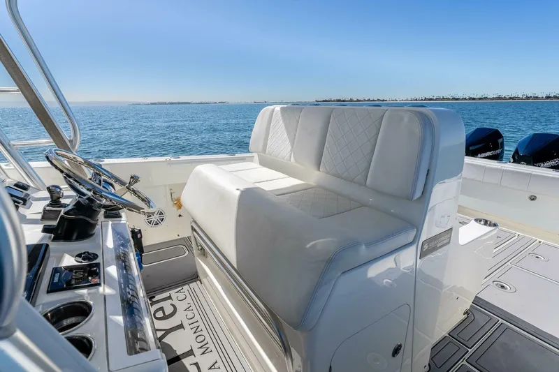 Susan L Yacht Photos Pics 2018 SeaVee 370 Z boat interior with white seating and ocean view.