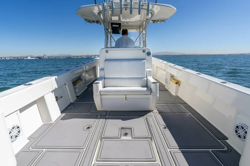 Susan L Yacht Photos Pics 2018 SeaVee 370 Z boat on open water, featuring spacious deck and seating.
