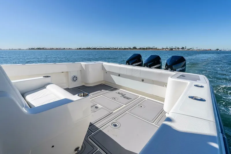 Susan L Yacht Photos Pics 2018 SeaVee 370 Z boat with triple Mercury engines on open water.