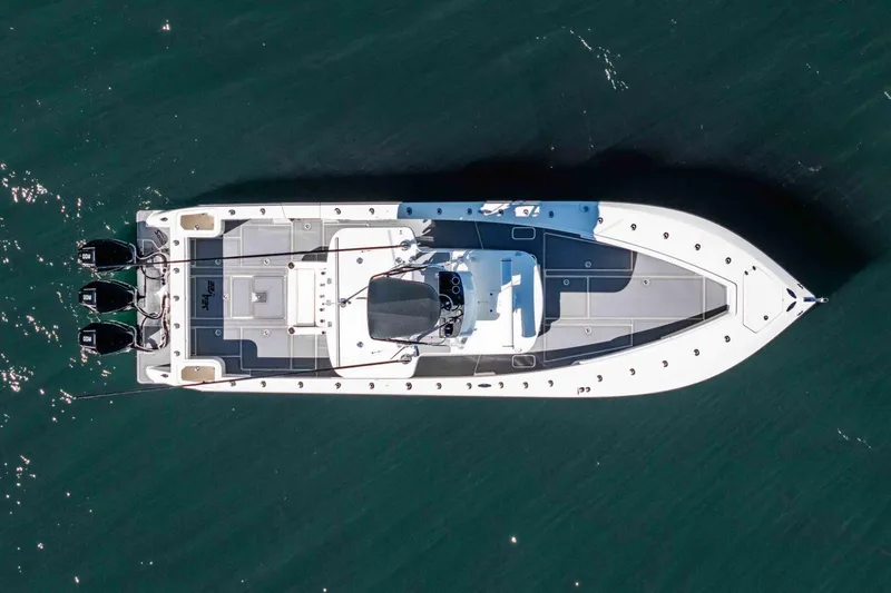 Susan L Yacht Photos Pics Aerial view of 2018 SeaVee 370 Z boat with triple outboard engines.