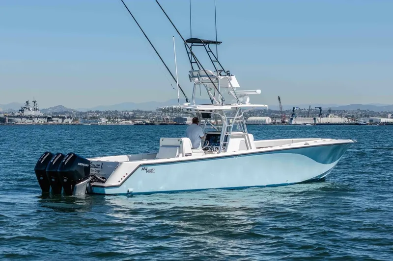 Susan L Yacht Photos Pics 2018 SeaVee 370 Z boat on water with triple outboard engines.