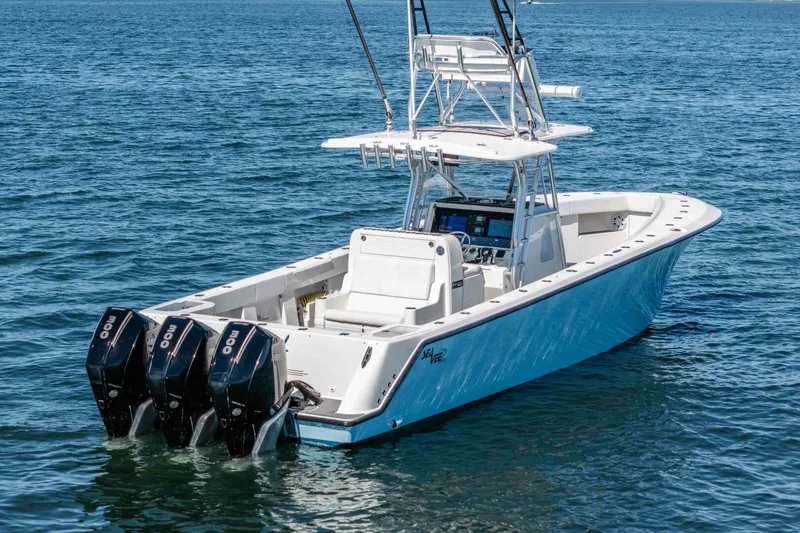 Susan L Yacht Photos Pics 2018 SeaVee 370 Z boat with triple outboard engines on open water.