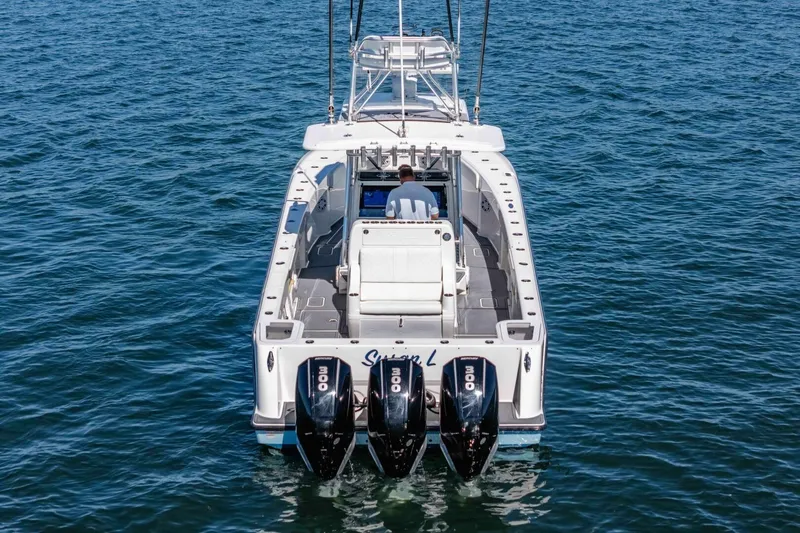 Susan L Yacht Photos Pics 2018 SeaVee 370 Z boat with triple outboard engines on open water.
