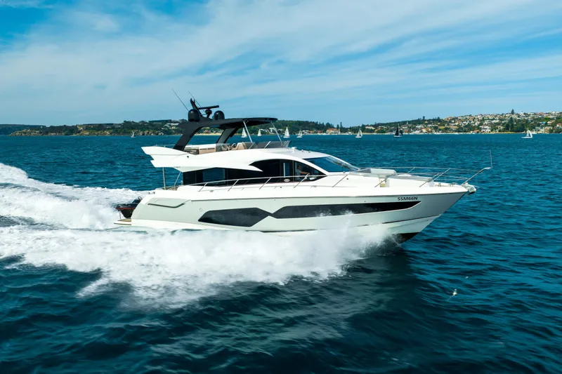 Mahalo Yacht Photos Pics 2018 Sunseeker Manhattan 66 yacht cruising on open water.