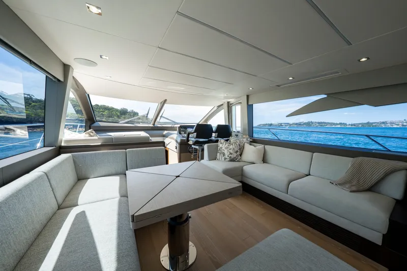 Mahalo Yacht Photos Pics Luxurious interior of 2018 Sunseeker Manhattan 66 yacht with panoramic ocean views.